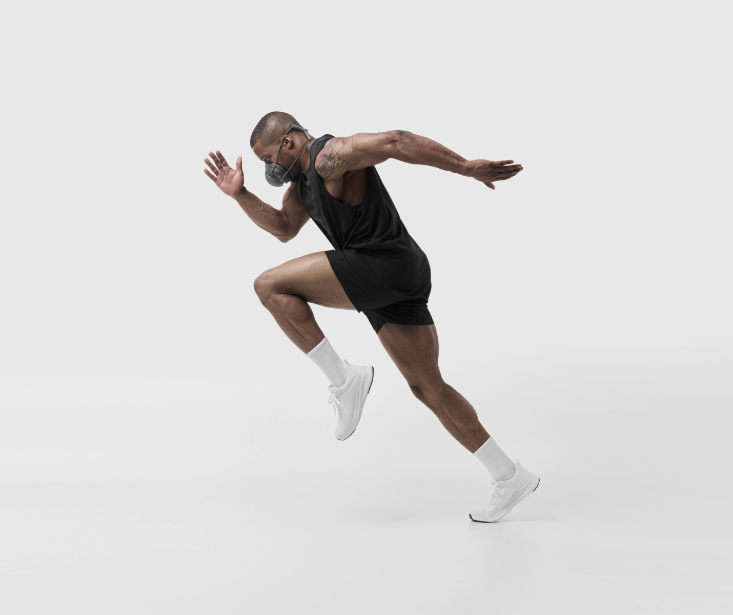 Side view of a person running while wearing a PACER